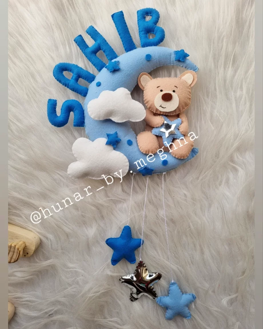 teddy on moon baby name hanging