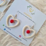 pearl earrings with a pretty rose bead