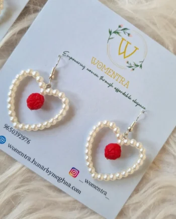pearl earrings with a pretty rose bead