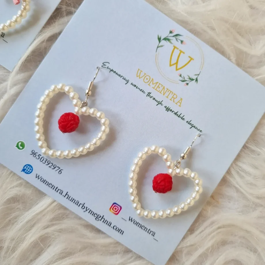 pearl earrings with a pretty rose bead