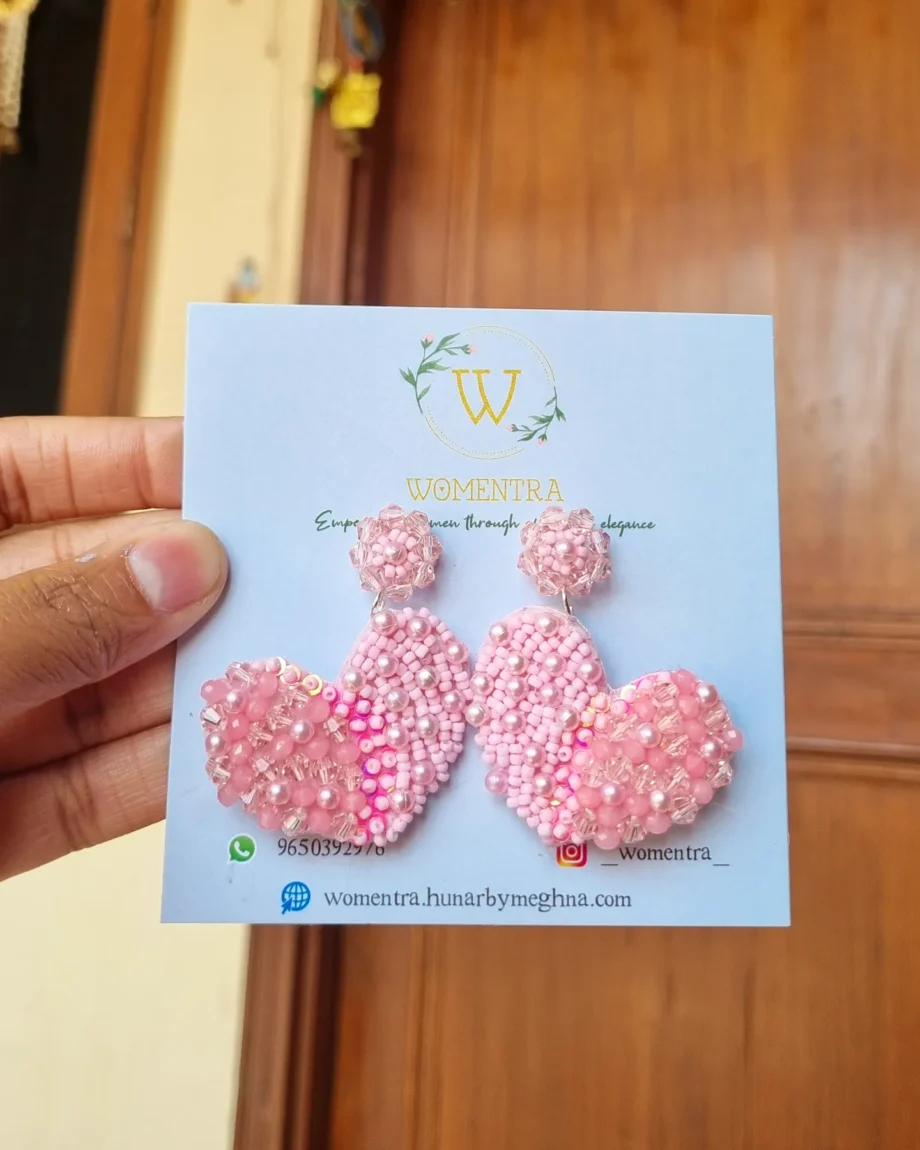 pink pearl earrings in heart shape