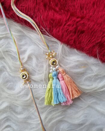 couple rakhi pair in pretty pastel colors