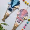 kids personalized room decor with name hanging in blue and pink