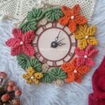 handcrafted macrame flower wall clock in pretty spring color pallet