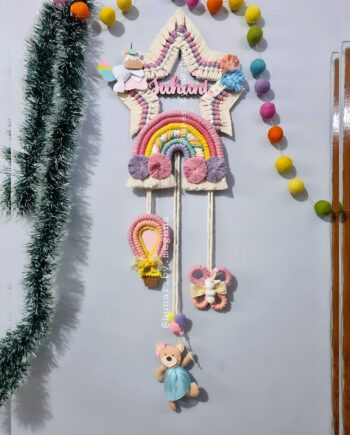 macrame name hanging with adorable teddy, hot air balloon, butterfly, unicorn and pretty rainbow