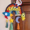 kids name hanging in space theme with rocket astronaut rainbow stars