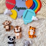 colorful balloons with cute animals name hanging and birth stats decor