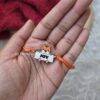 tiger rakhi with name that can be reused as fridge magnet