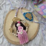 parents to be rakhi with bhabhi lumba in macrame handmade doll mom to be and dad to be rakhi