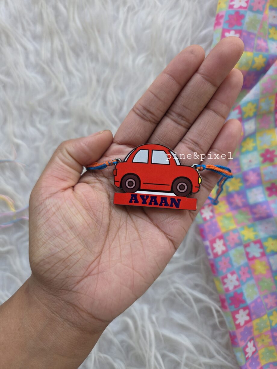 kids red car rakhi with name and reusable as fridge magnet