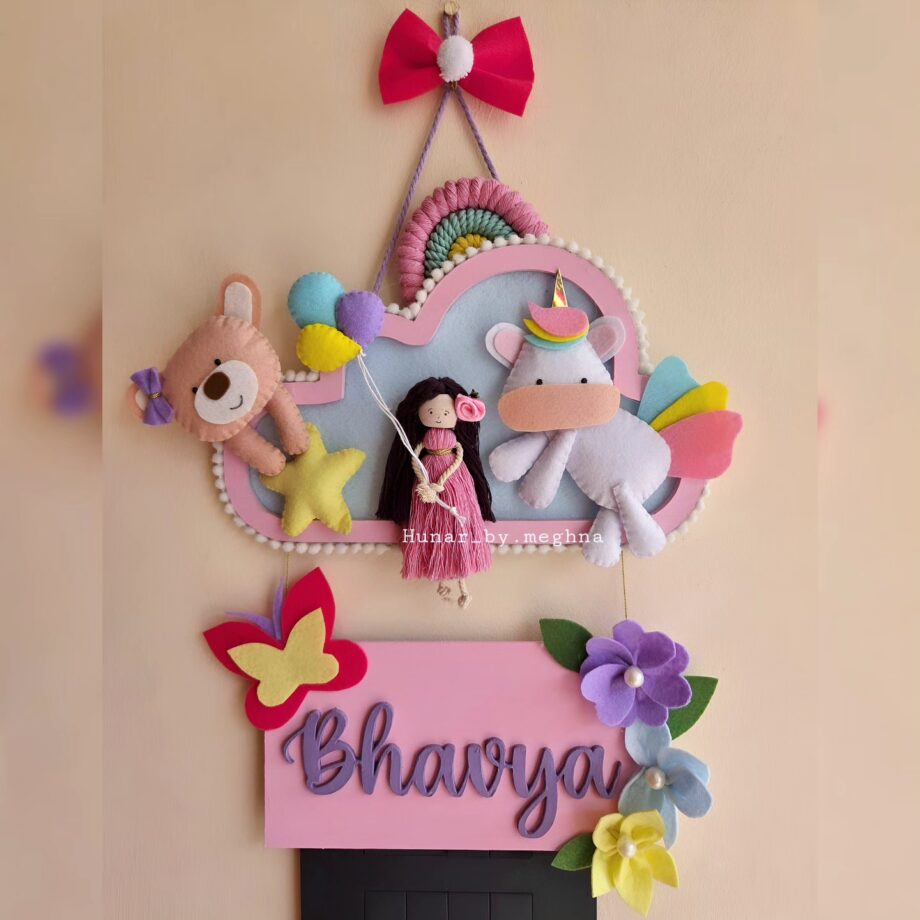 macrame doll and felt unicorn teddy name plate with wooden cloud and name plank in pretty pink color for nursery decor and kids room decor